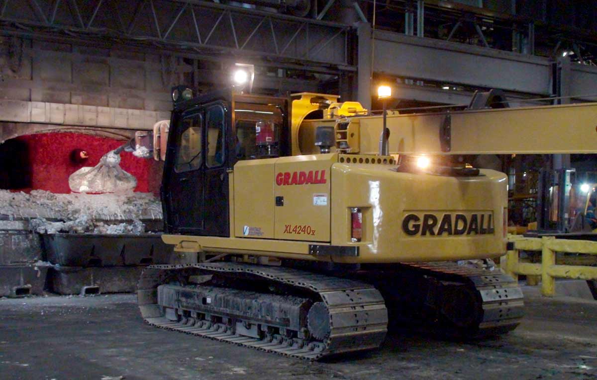 Gradall XL 4240 V crawler aluminum mill maintenance machine at a furnace